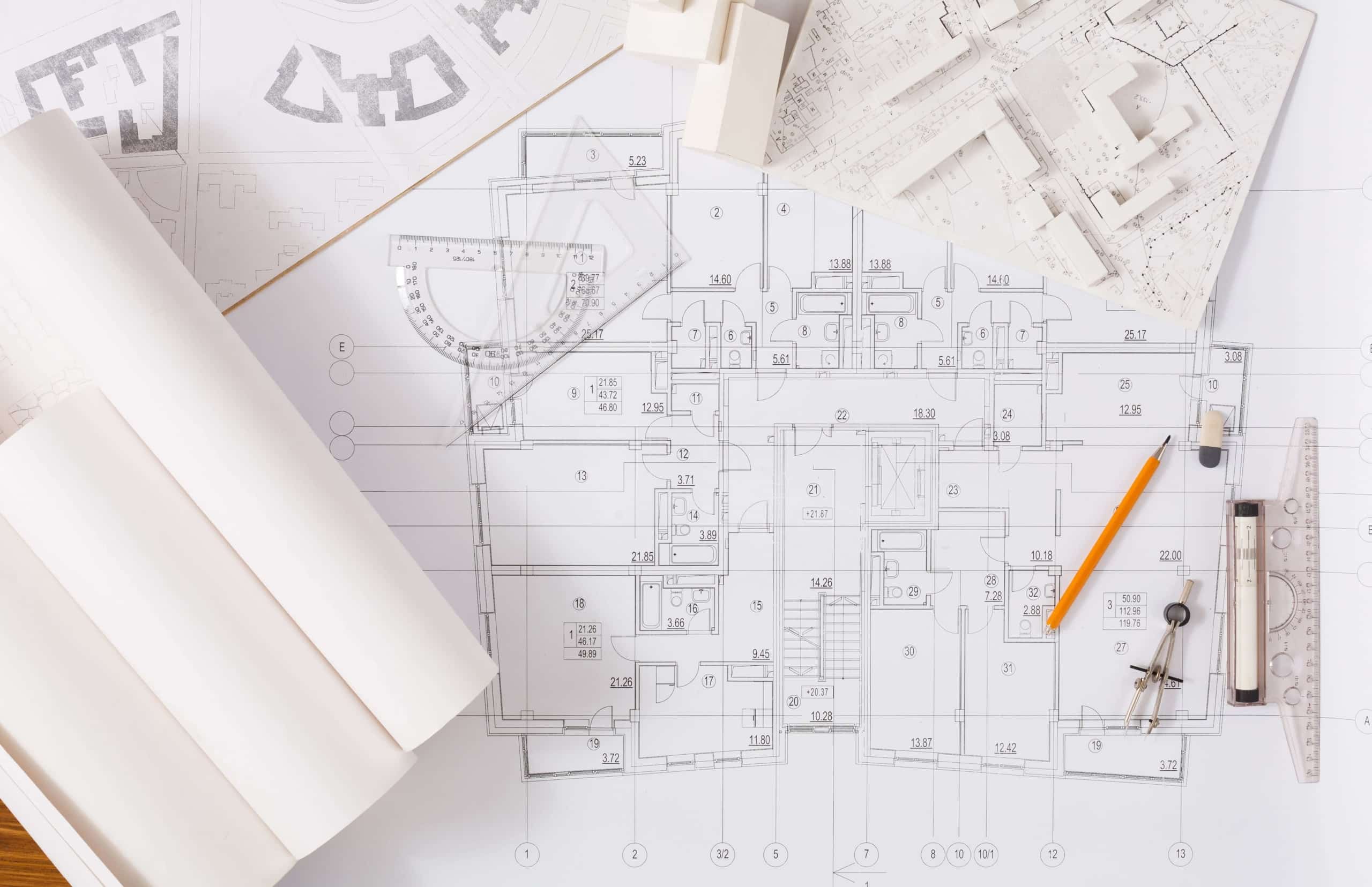 An architect's building blueprints on a table